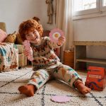 Child using a LinkKit fried egg small case textile kit at home